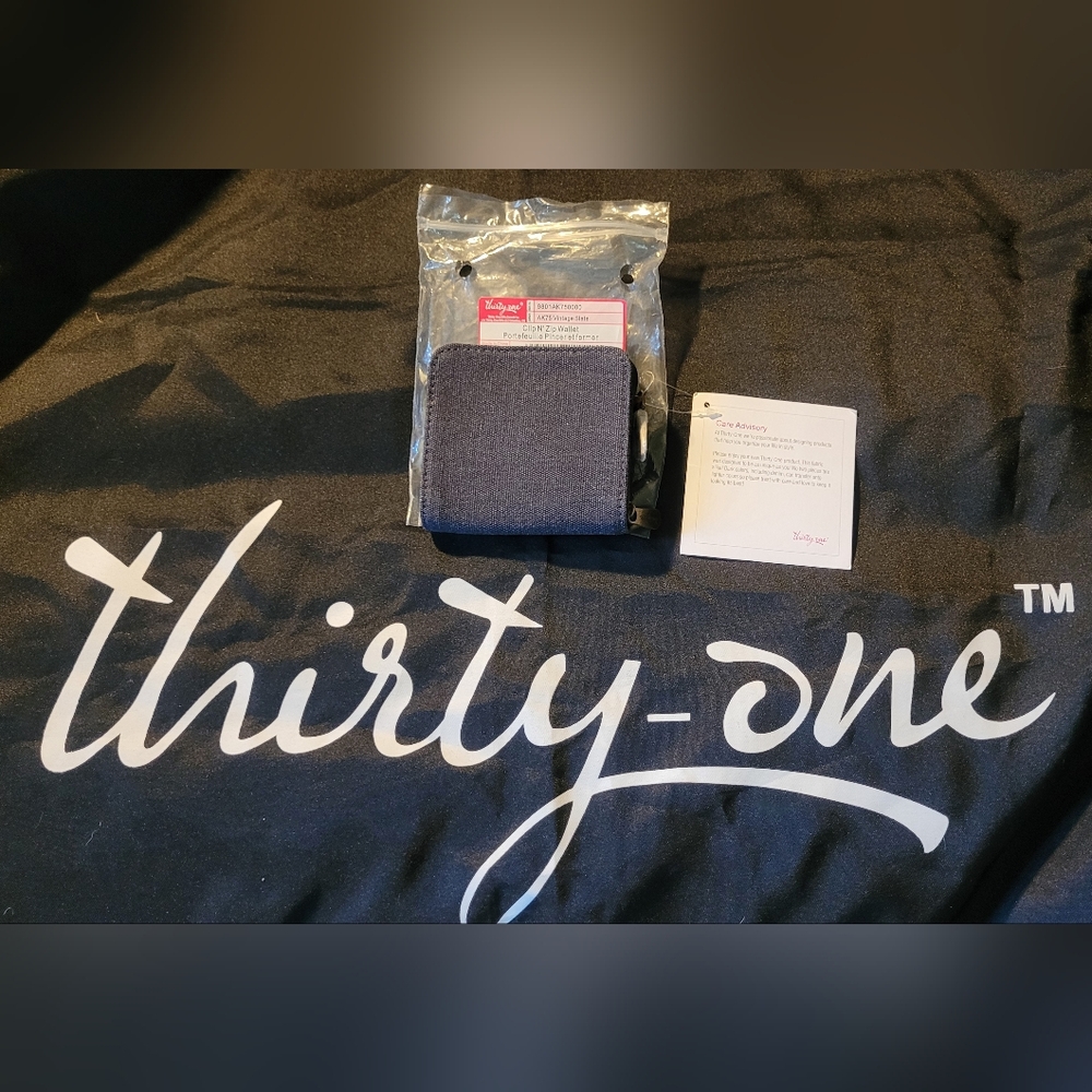 NEW CLIP N ZIP WALLET